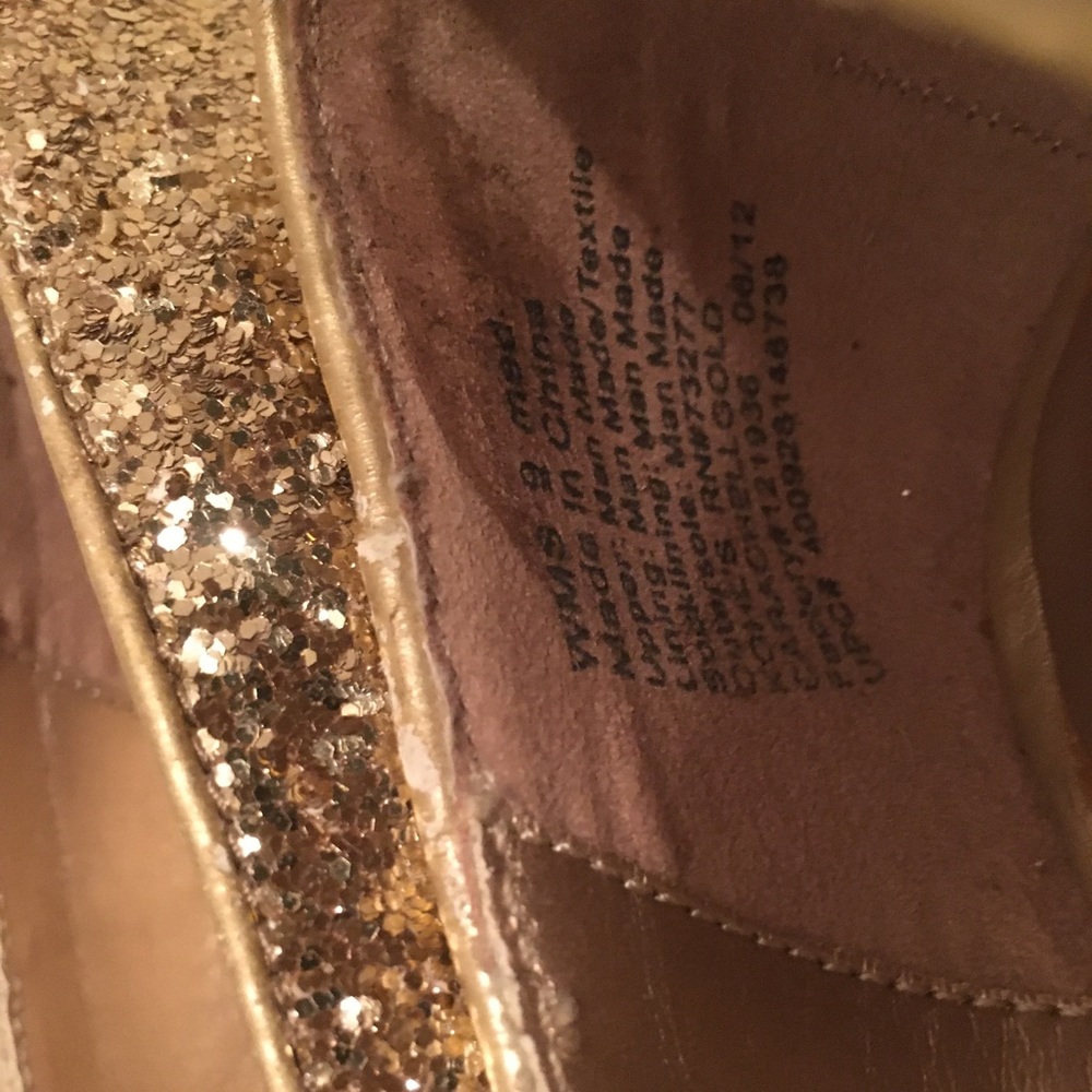 Women gold over 4” heals; worn only twice.